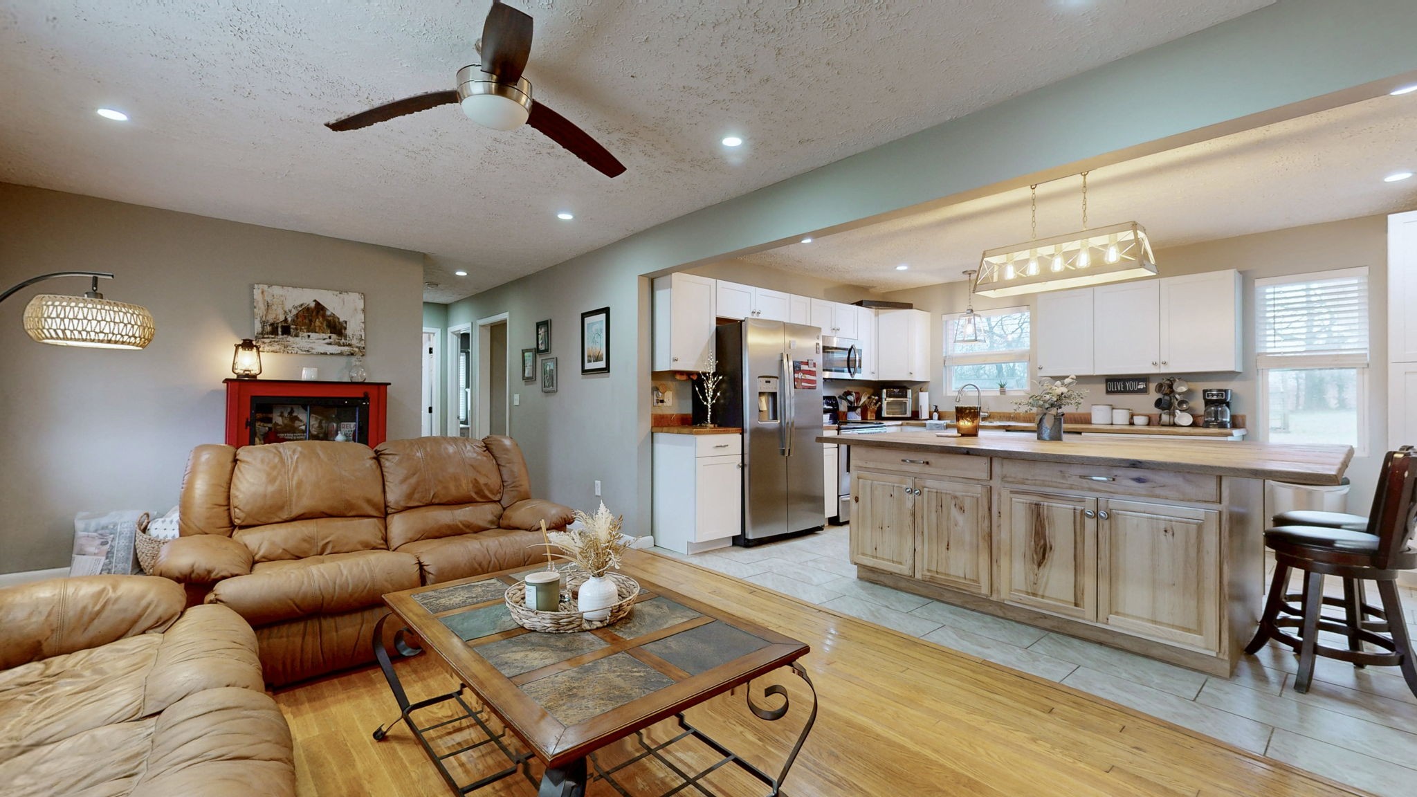 3182 Cairo Bend Road Lebanon, TN 37087 - Photo 13 of 51 a living room with furniture kitchen and a wooden floor
