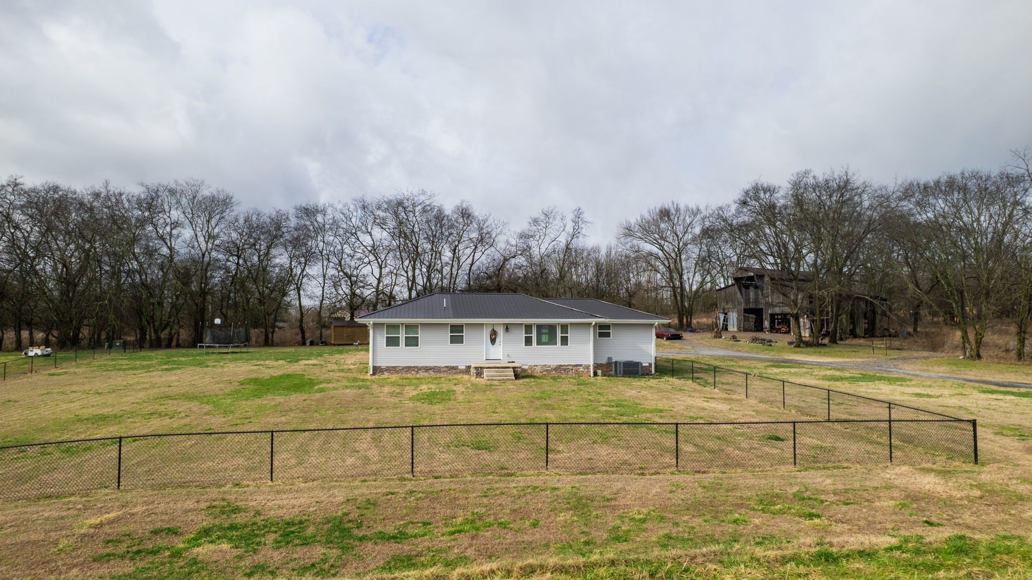 3182 Cairo Bend Road Lebanon, TN 37087 - Photo 2 of 51 a view of an outdoor space and swimming pool