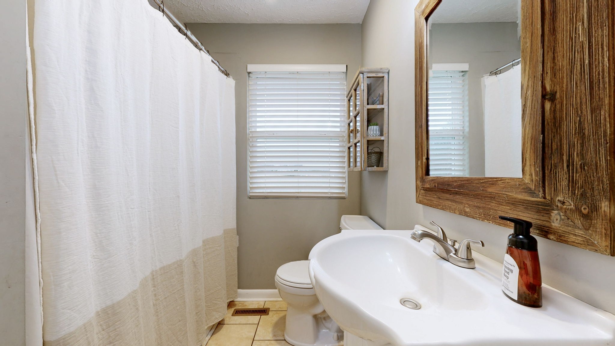 3182 Cairo Bend Road Lebanon, TN 37087 - Photo 25 of 51 a bathroom with a sink and a toilet
