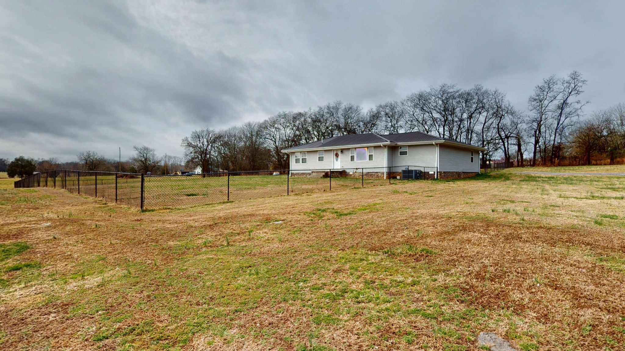 3182 Cairo Bend Road Lebanon, TN 37087 - Photo 28 of 51 a view of a big yard with palm trees