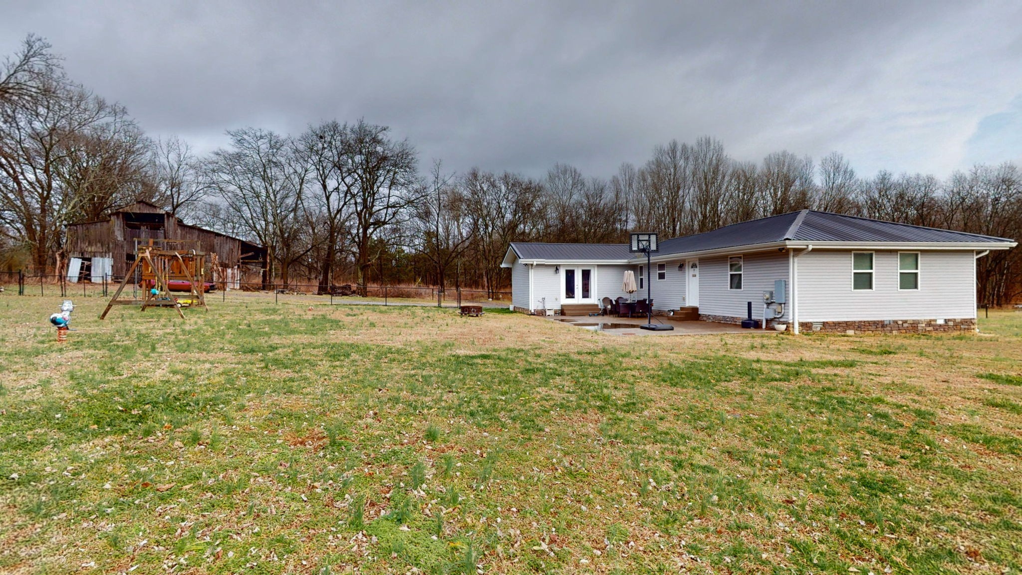 3182 Cairo Bend Road Lebanon, TN 37087 - Photo 32 of 51 a front view of house with yard and trees in the background