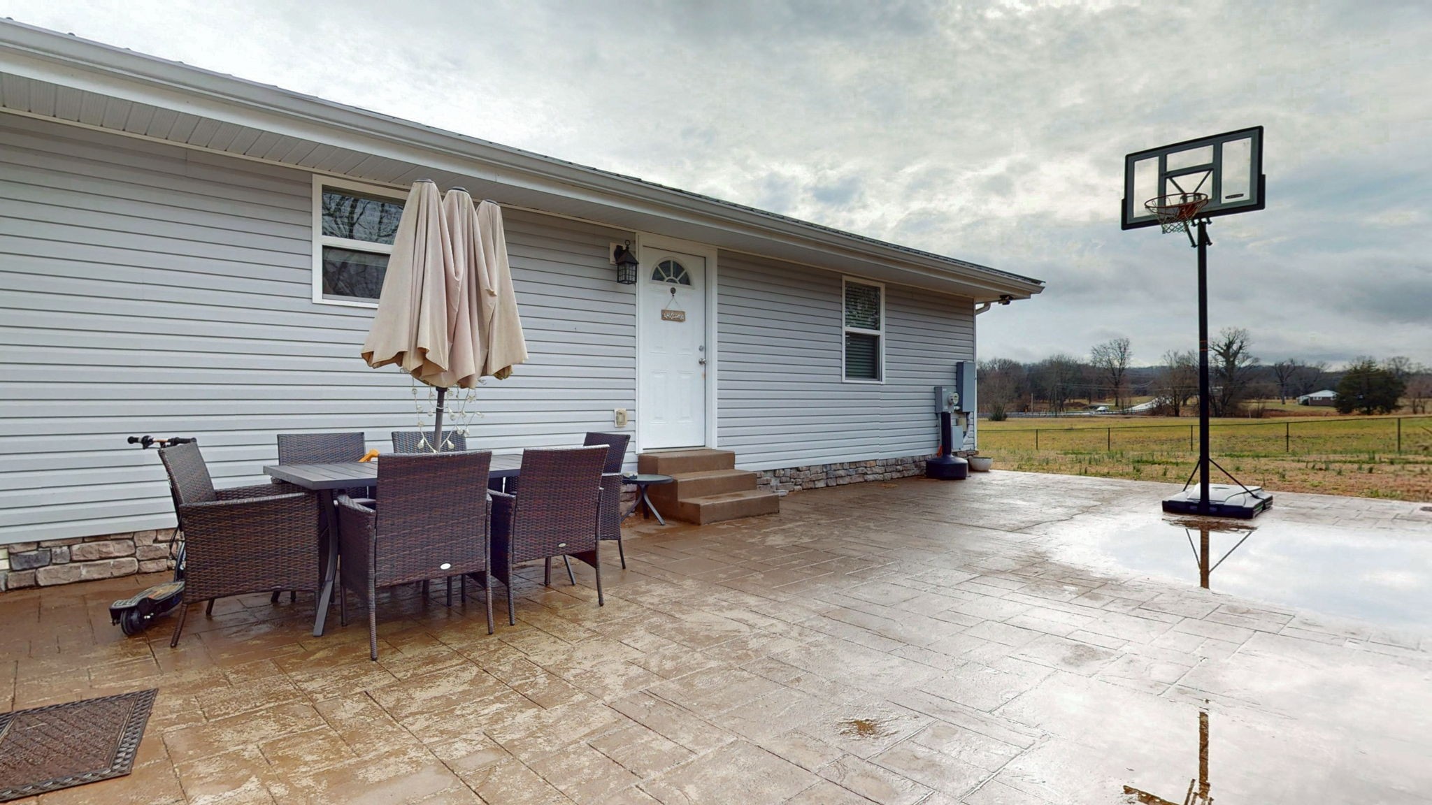 3182 Cairo Bend Road Lebanon, TN 37087 - Photo 34 of 51 a backyard of a house with barbeque oven table and chairs