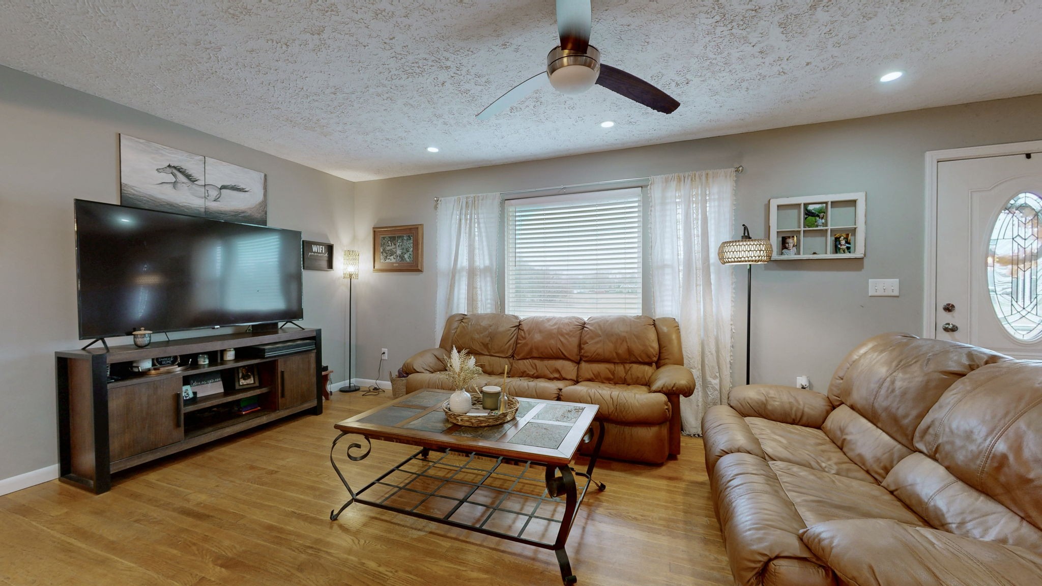 3182 Cairo Bend Road Lebanon, TN 37087 - Photo 7 of 51 a living room with furniture and a flat screen tv