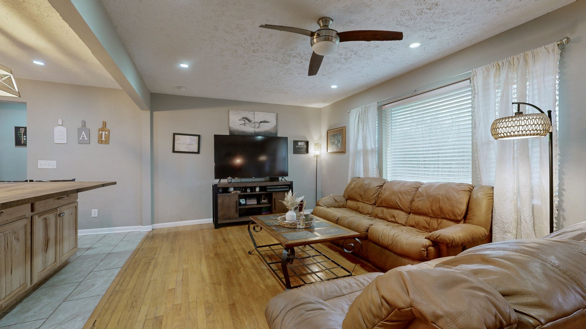 3182 Cairo Bend Road Lebanon, TN 37087 - Photo 8 of 51 a living room with furniture and a flat screen tv