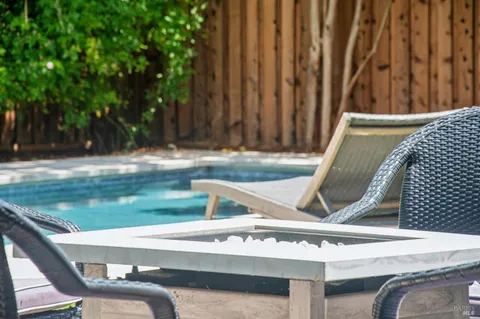 a view of swimming pool with a yard