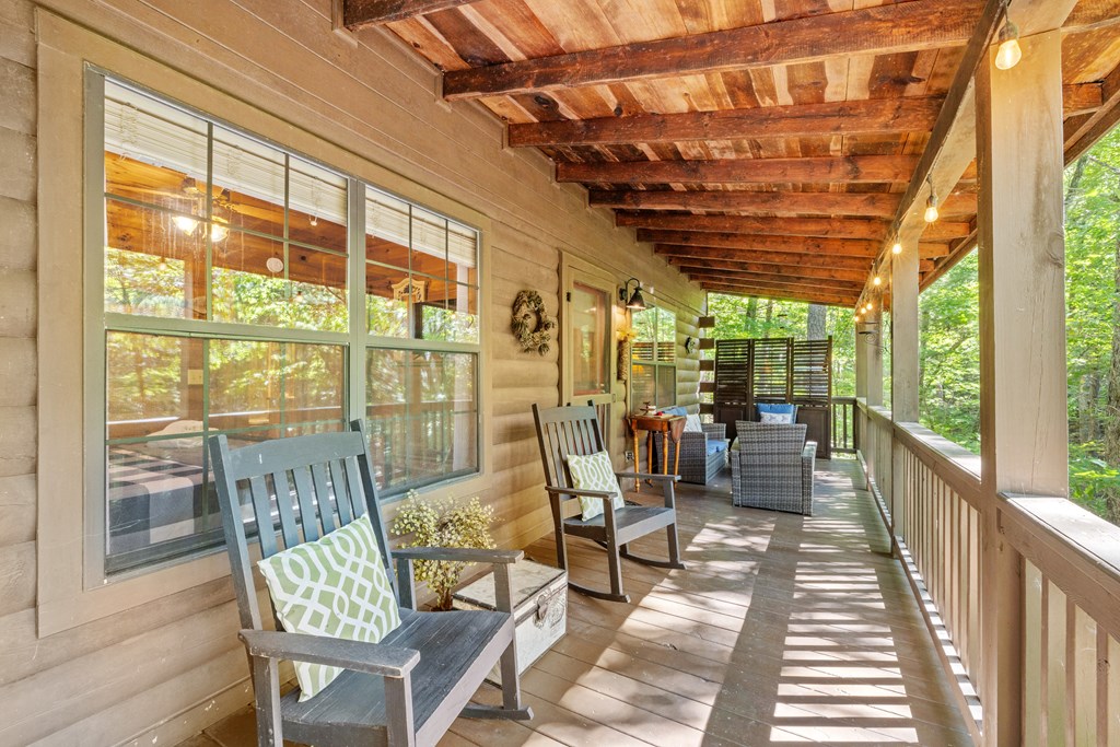 129 Cherokee Drive Blue Ridge, GA 30513 - Photo 15 of 26 a view of a dining room with furniture wooden floor and outside view