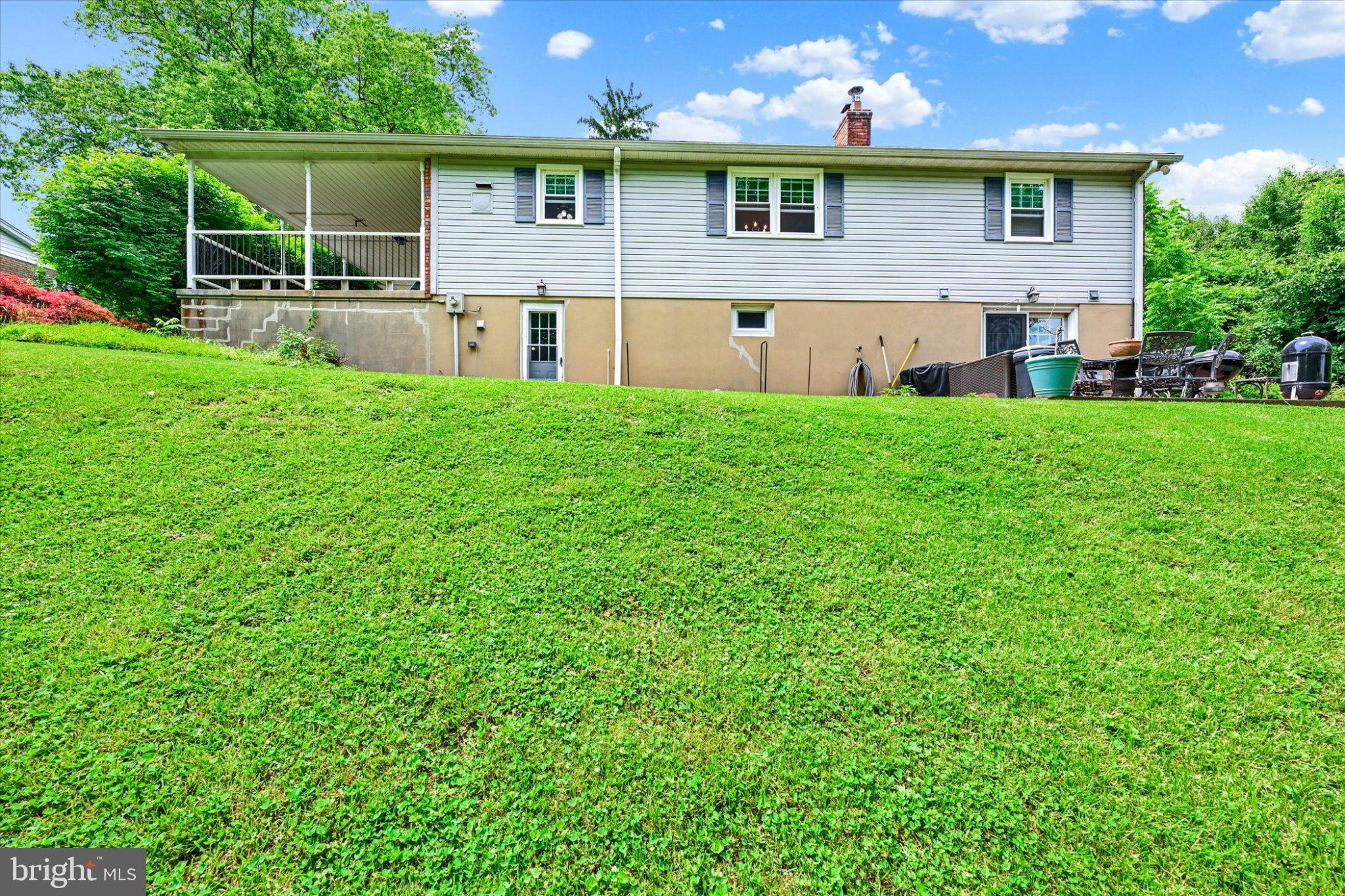 1309 Mill Creek Road Fallston, MD 21047 - Photo 34 of 44 Charming hillside home with lush lawn.