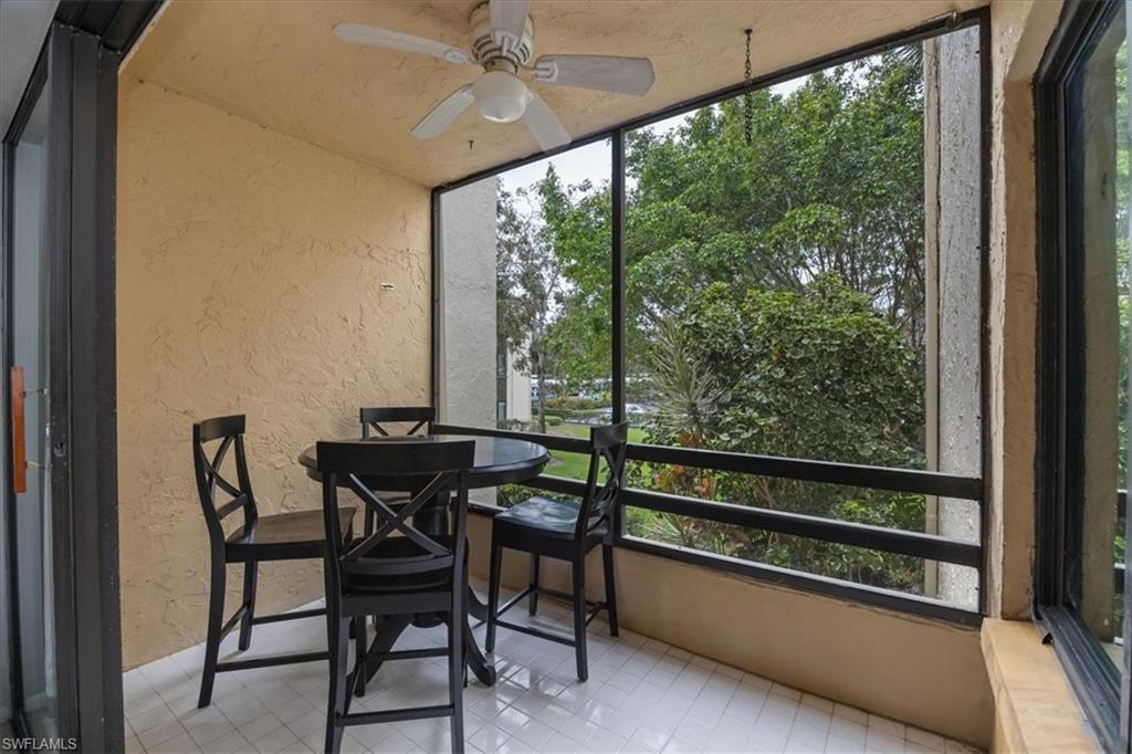 3635 Boca Ciega Drive, Unit 207 Naples, FL 34112 - Photo 18 of 24 a view of a outdoor space with seating area
