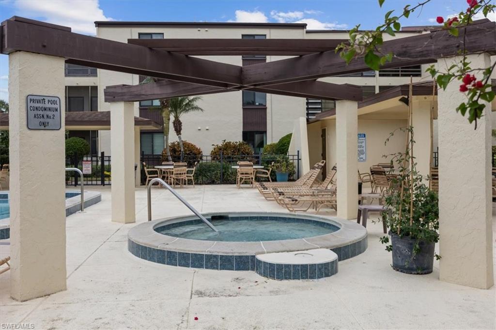 3635 Boca Ciega Drive, Unit 207 Naples, FL 34112 - Photo 20 of 24 a view of a living room with a potted plant