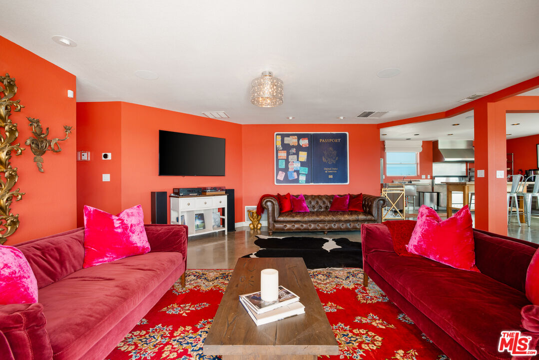 64425 Carot Road Joshua Tree, CA 92252 - Photo 15 of 73 a living room with furniture and a flat screen tv
