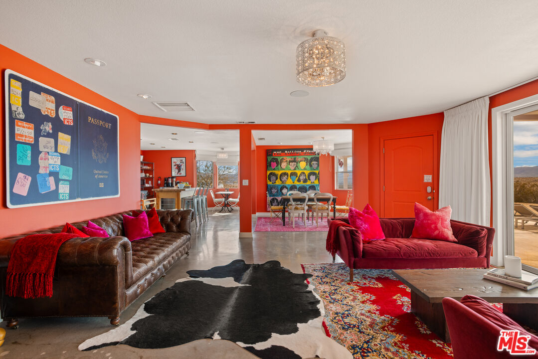 64425 Carot Road Joshua Tree, CA 92252 - Photo 18 of 73 a living room with furniture and a large window