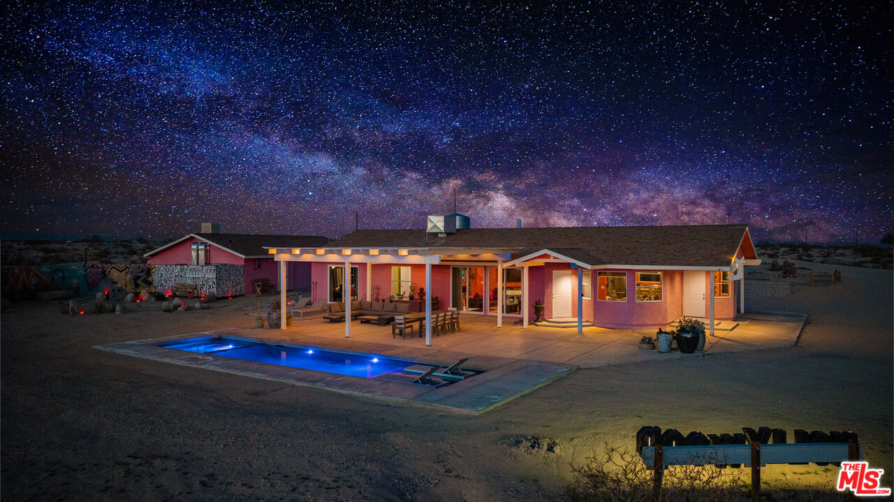 64425 Carot Road Joshua Tree, CA 92252 - Photo 2 of 73 an aerial view of a house with swimming pool patio and fire pit