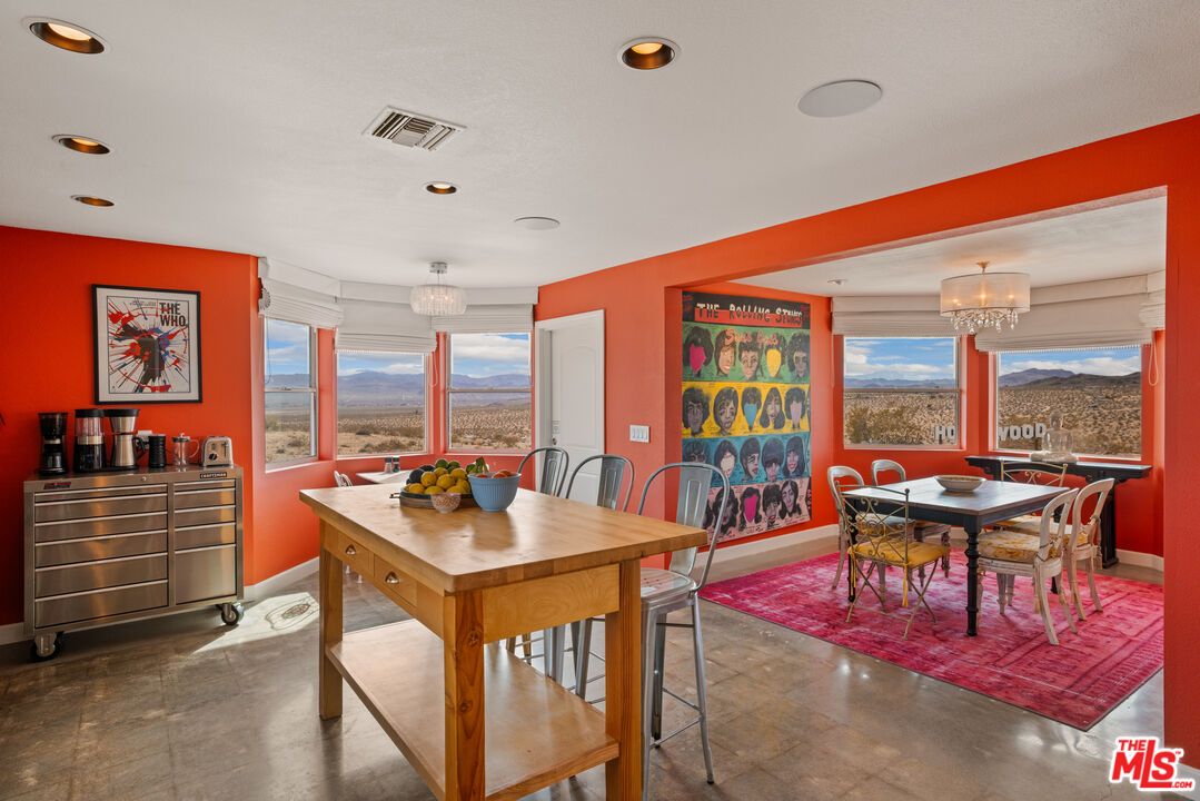 64425 Carot Road Joshua Tree, CA 92252 - Photo 24 of 73 a view of a dining room with furniture window and outside view