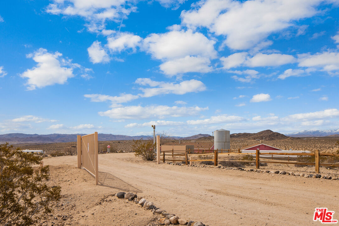 64425 Carot Road Joshua Tree, CA 92252 - Photo 3 of 73 a view of a beach with a building in the background