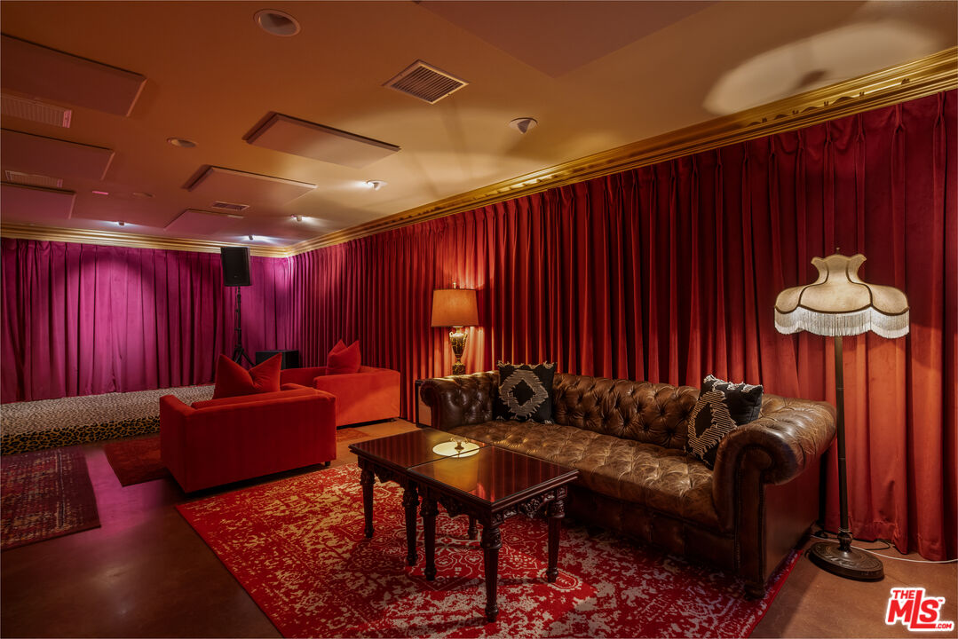 64425 Carot Road Joshua Tree, CA 92252 - Photo 39 of 73 a living room with furniture a lamp and a fireplace