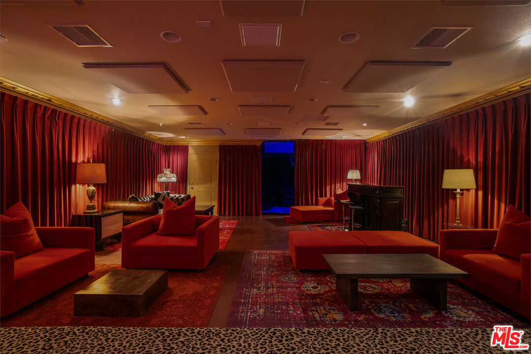 64425 Carot Road Joshua Tree, CA 92252 - Photo 42 of 73 a living room with furniture a rug and a large window
