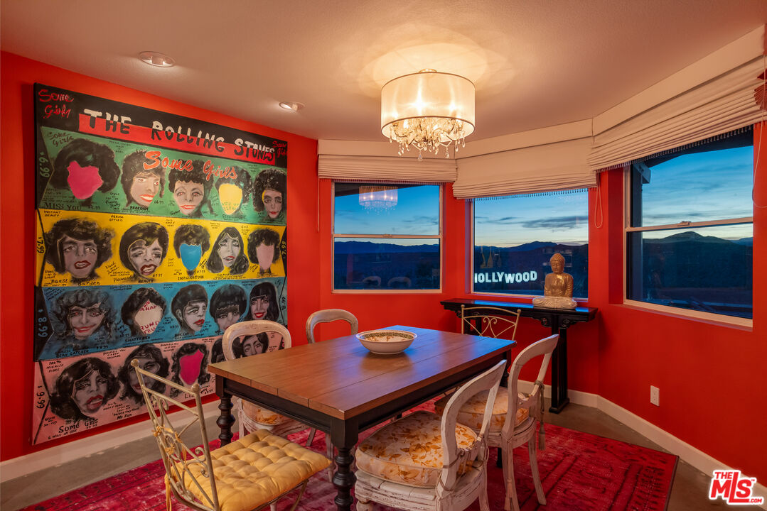 64425 Carot Road Joshua Tree, CA 92252 - Photo 64 of 73 a view of a dining room with furniture and chandelier