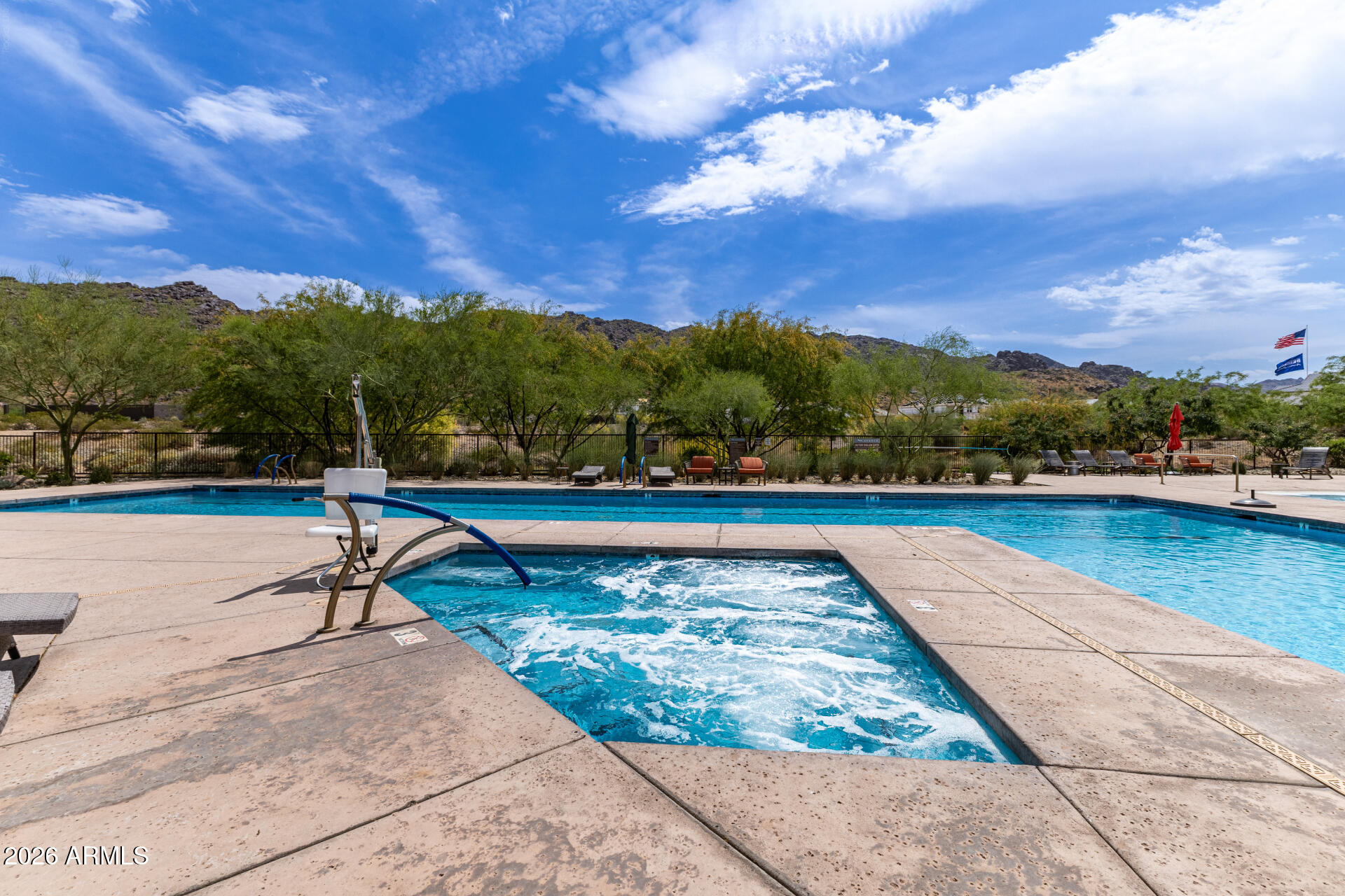 9818 South 7th Place Phoenix, AZ 85042 - Photo 52 of 62 a view of swimming pool with outdoor seating and yard in back