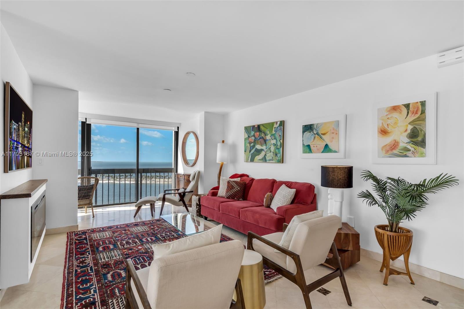 2333 Brickell Avenue, Unit 1401 Miami, FL 33129 - Photo 11 of 36 a living room with furniture and a window