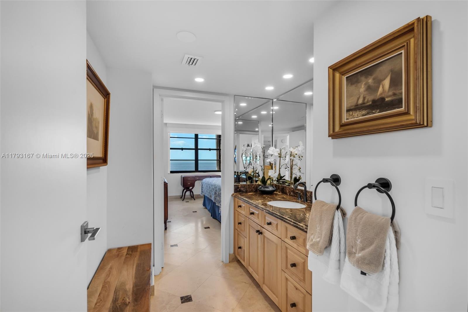 2333 Brickell Avenue, Unit 1401 Miami, FL 33129 - Photo 17 of 36 a view of a livingroom with furniture and window