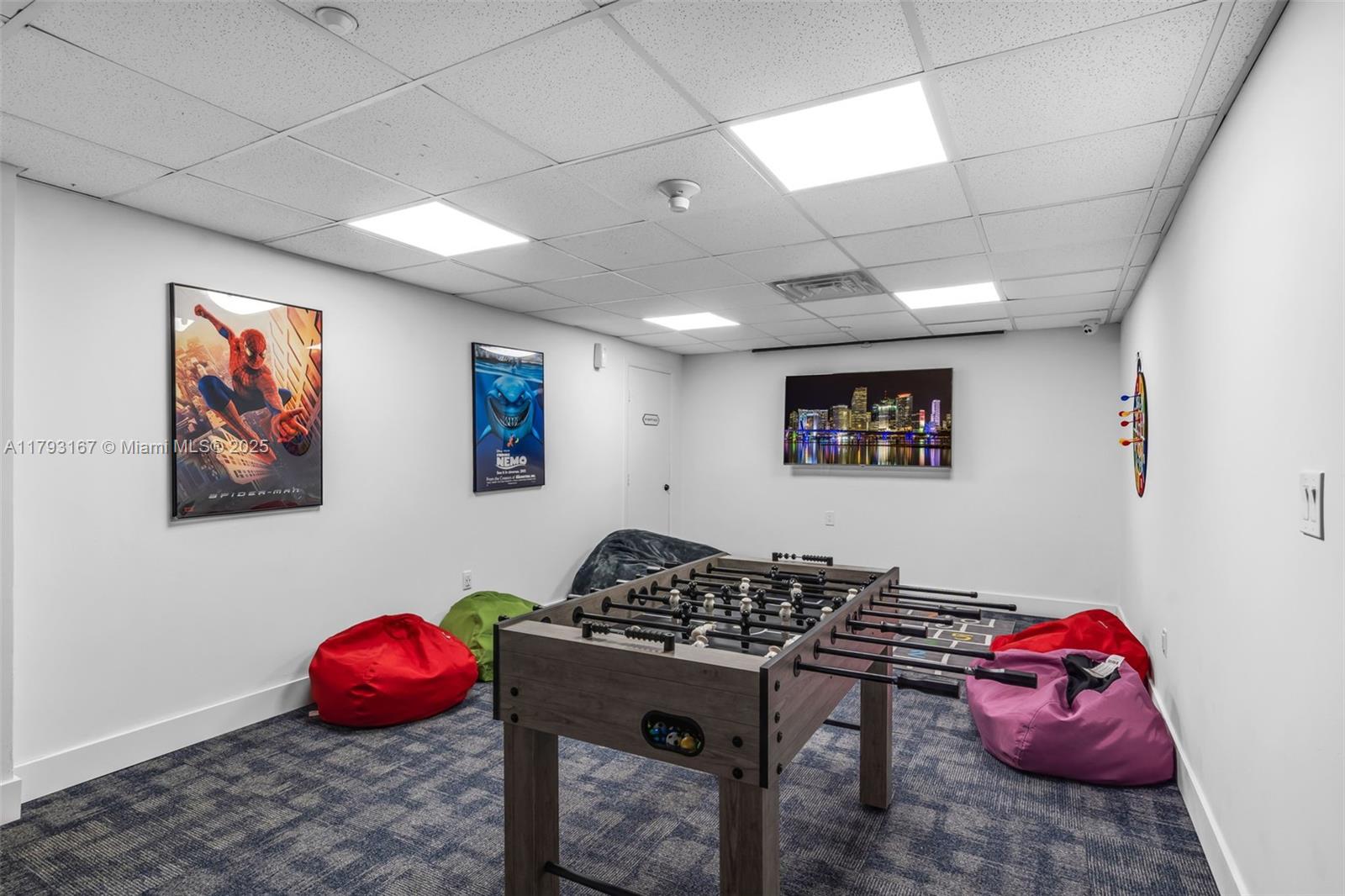 2333 Brickell Avenue, Unit 1401 Miami, FL 33129 - Photo 29 of 36 a bedroom with furniture and a wooden floor