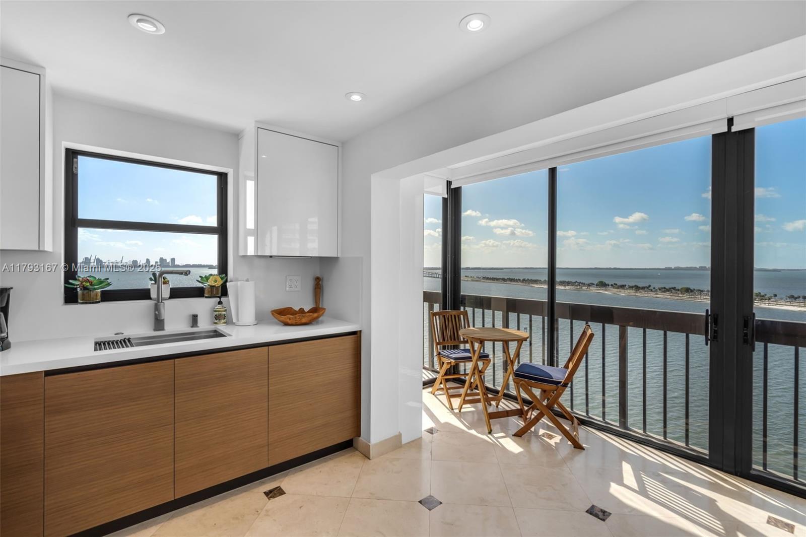 2333 Brickell Avenue, Unit 1401 Miami, FL 33129 - Photo 8 of 36 a very nice looking room with a large window