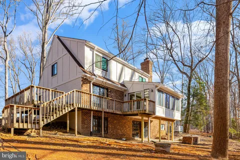 a house with trees in front of it