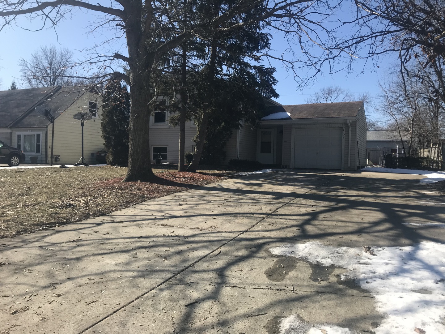 167 Seabury Road Bolingbrook, IL 60440 - Photo 3 of 17 a view of street along with trees