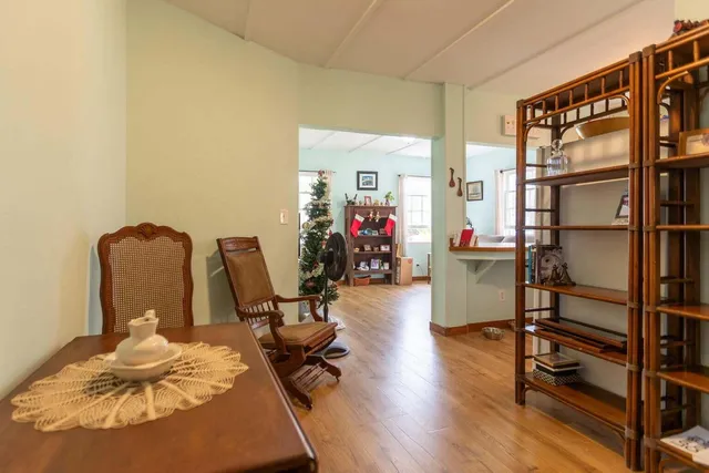 a view of a workspace with furniture and toys