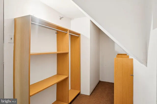 a swimming pool with outdoor seating and yard