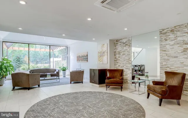 a view of an entryway with a livingroom