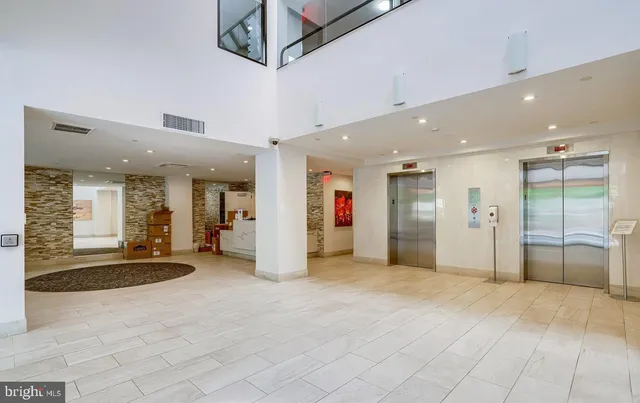 a view of a patio with couches and chairs