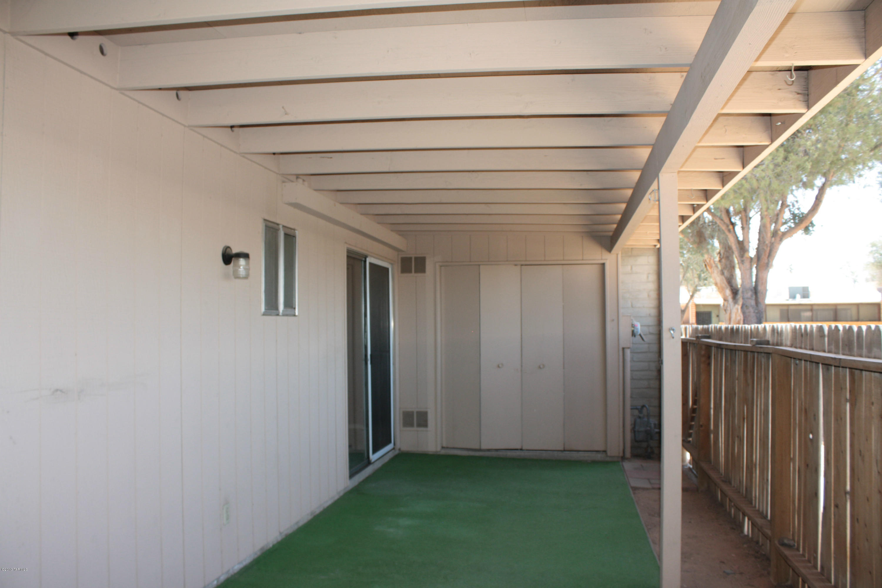 47 East Pastime Road Tucson, AZ 85705 - Photo 14 of 16 a view of a porch