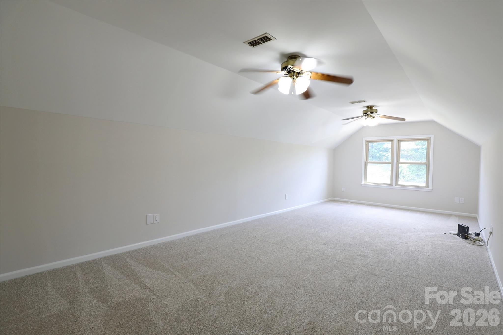 12809 Pine Bluff Road Midland, NC 28107 - Photo 23 of 41 a view of a window in an empty room