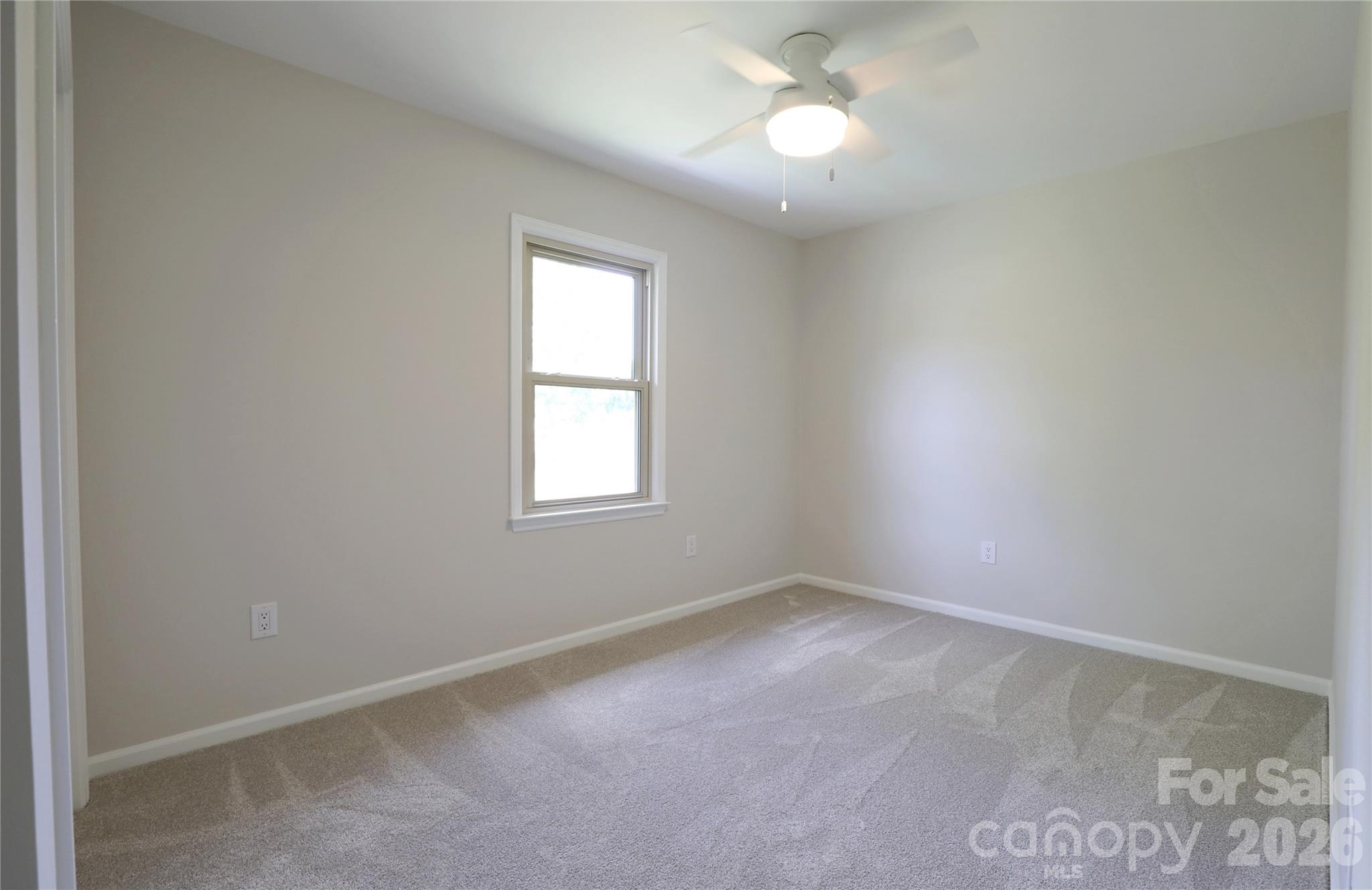 12809 Pine Bluff Road Midland, NC 28107 - Photo 28 of 41 an empty room with a window
