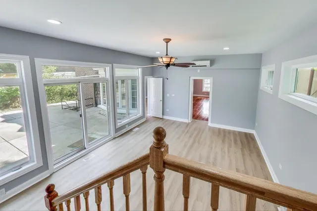a view of a hallway view with furniture