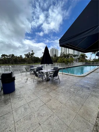 a view of a terrace with seating area and boat