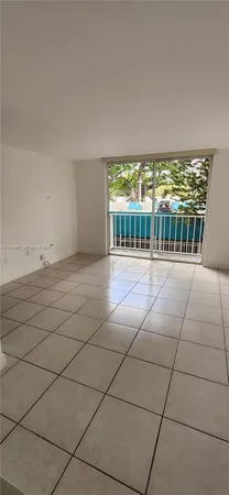a view of a room with windows