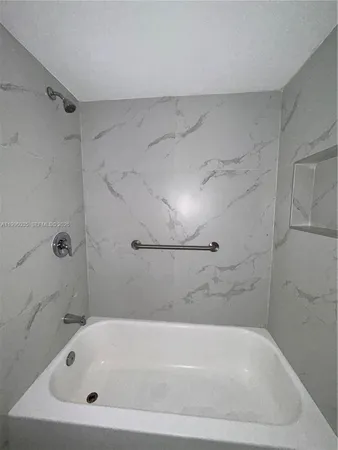 a bathroom with a tub