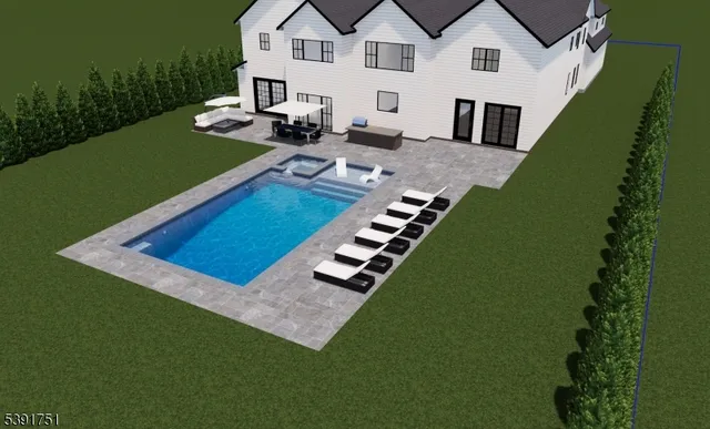 a view of a white house with a backyard