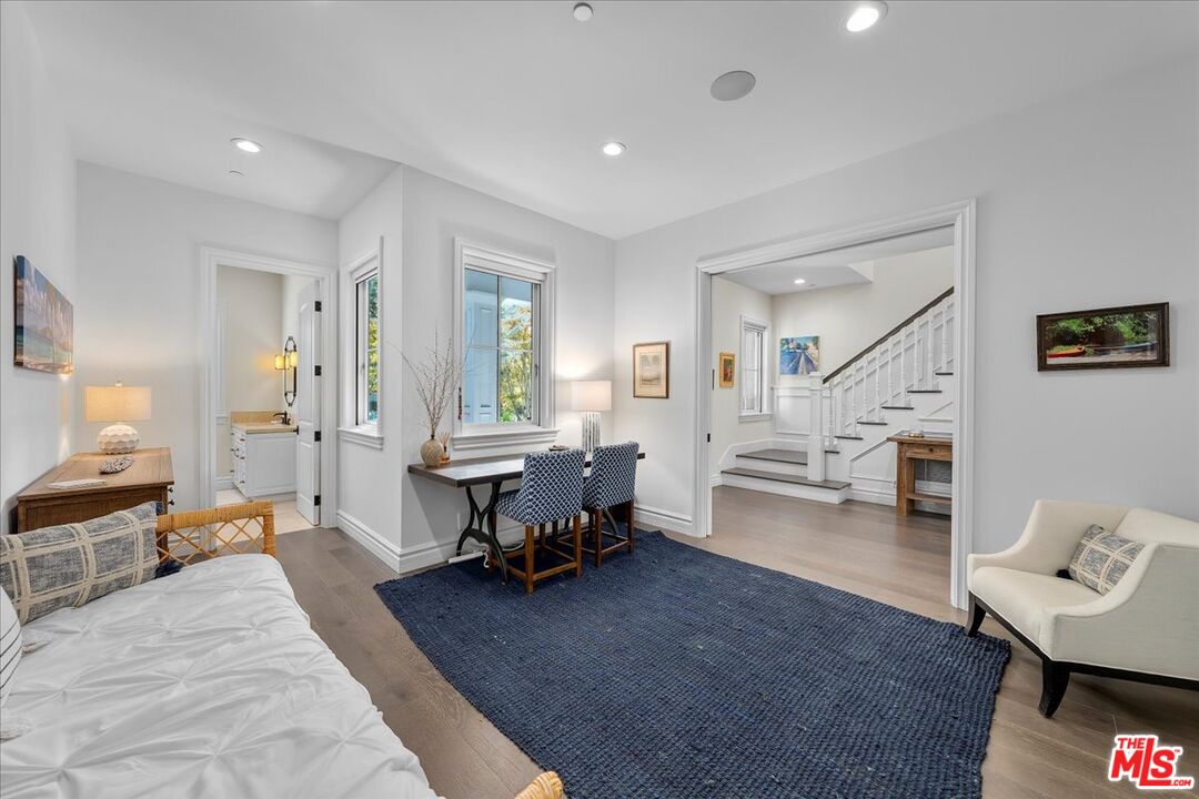 809 Leonard Road Los Angeles, CA 90049 - Photo 45 of 72 a living room with furniture and a wooden floor