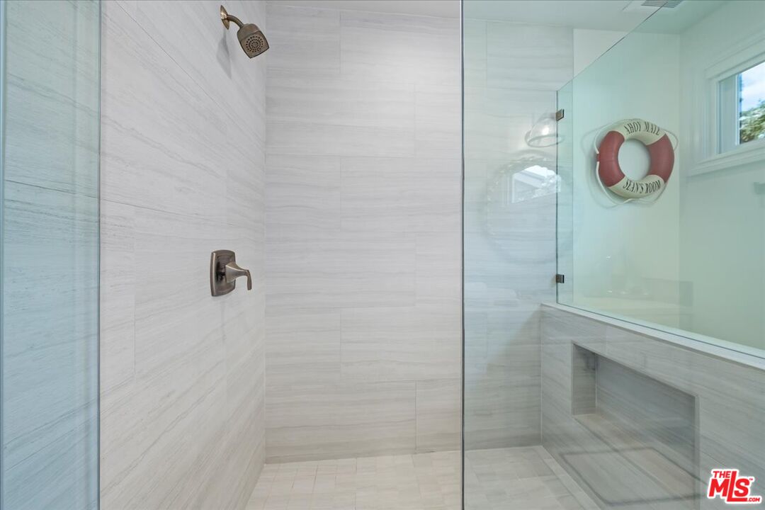809 Leonard Road Los Angeles, CA 90049 - Photo 54 of 72 a bathroom with a shower
