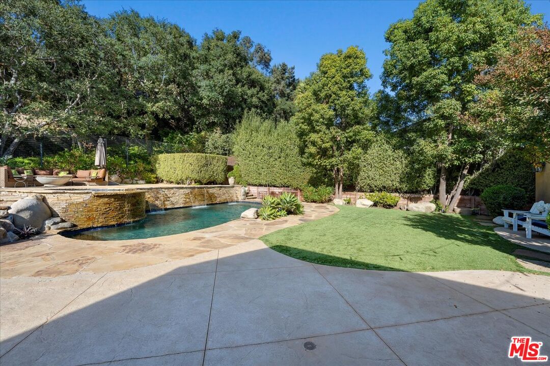 809 Leonard Road Los Angeles, CA 90049 - Photo 72 of 72 a view of backyard with swimming pool