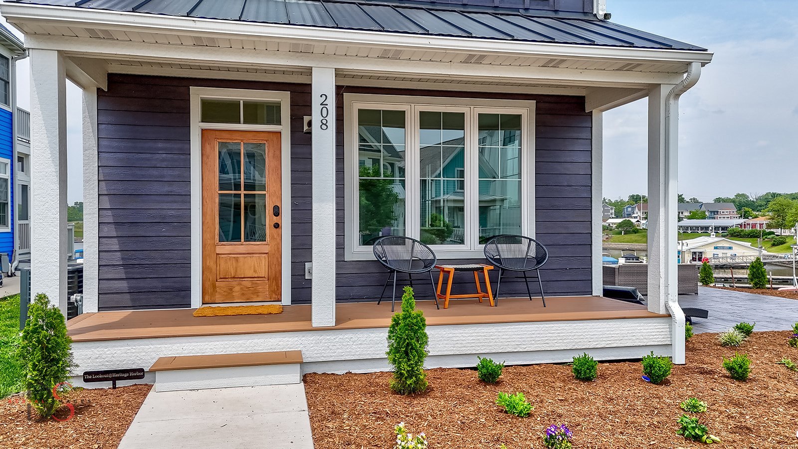 a view of brick building with outdoor seating