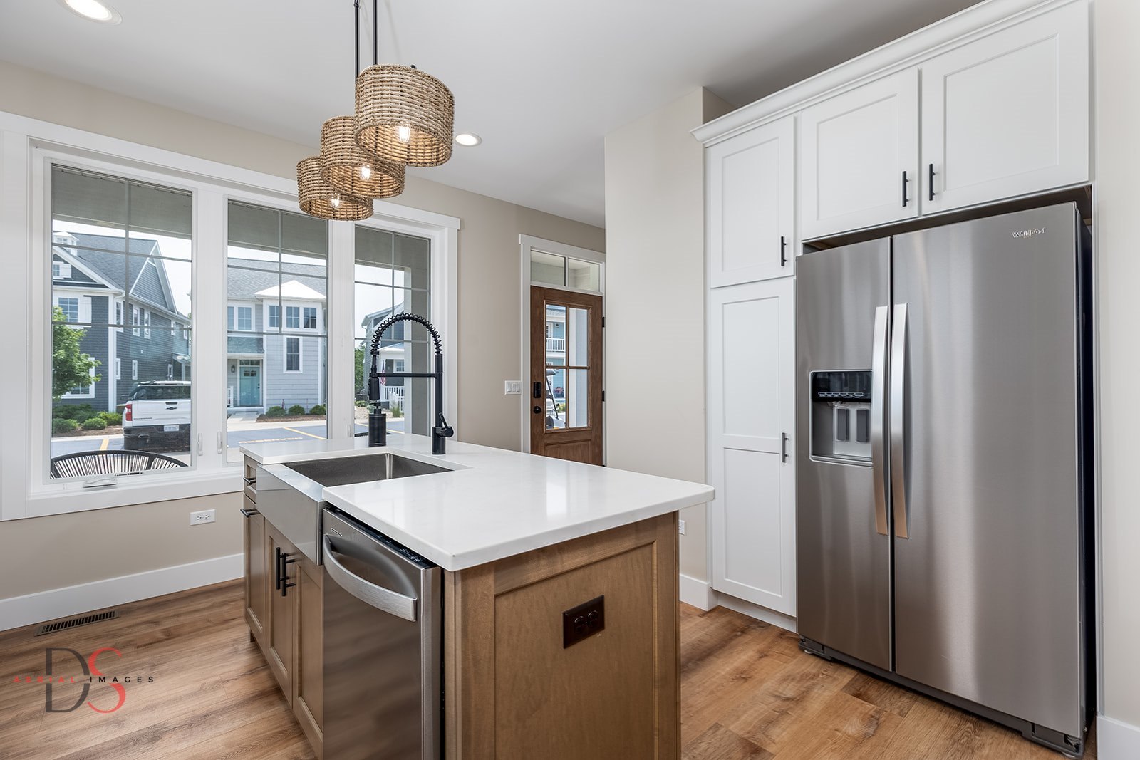 208 Leeward Way Ottawa, IL 61350 - Photo 9 of 28 a kitchen with a refrigerator a sink and cabinets