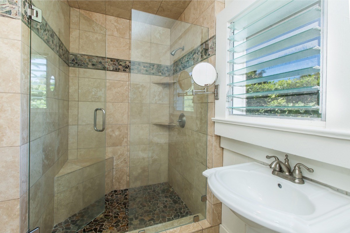 7206 Alamoo Road Hanalei, HI 96714 - Photo 12 of 17 a bathroom with a sink shower and mirror