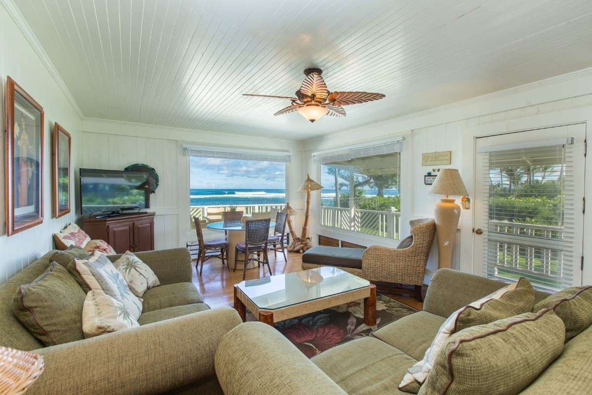 7206 Alamoo Road Hanalei, HI 96714 - Photo 3 of 17 a living room with furniture ceiling fan and a large window
