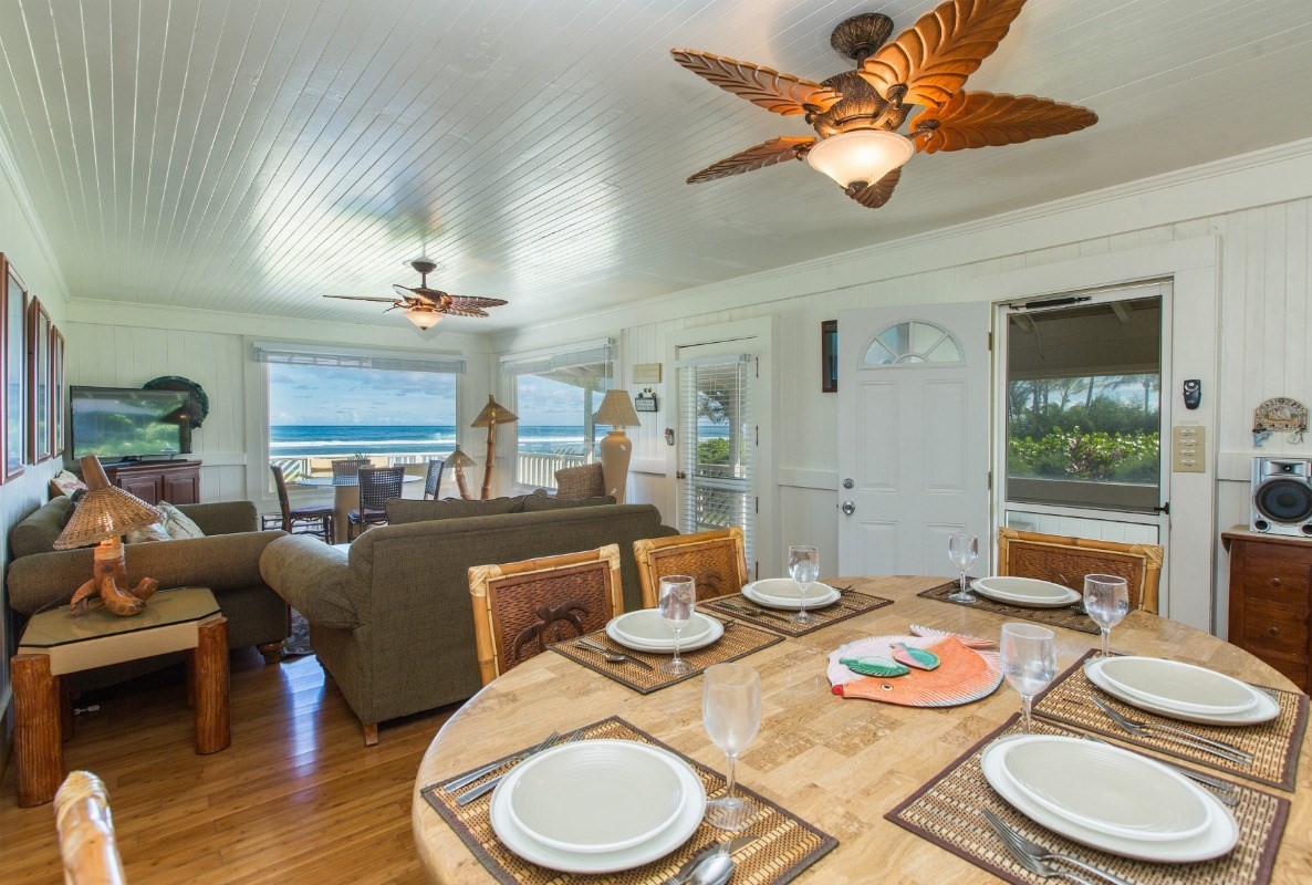 7206 Alamoo Road Hanalei, HI 96714 - Photo 4 of 17 a dining room with furniture a window and wooden floor