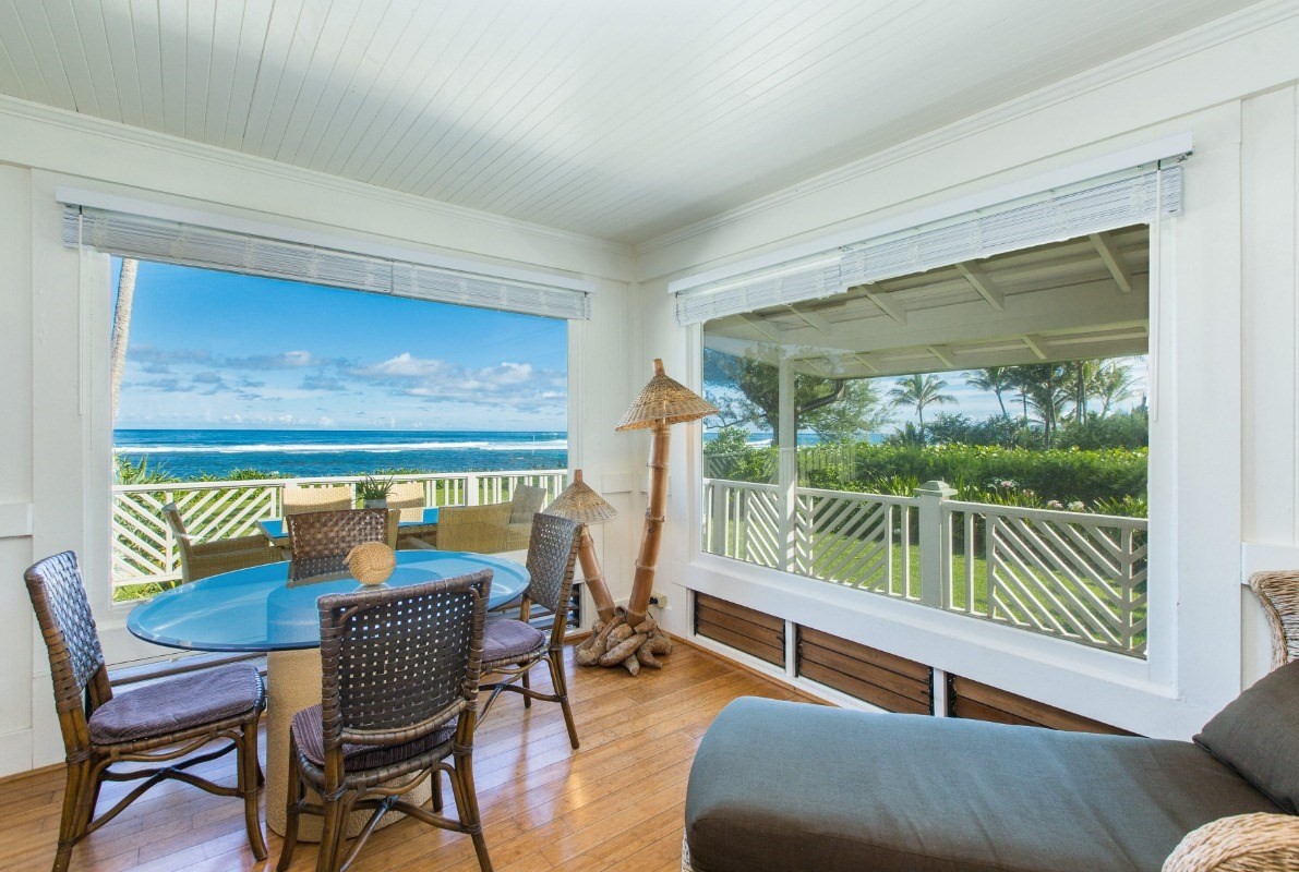 7206 Alamoo Road Hanalei, HI 96714 - Photo 5 of 17 a balcony with furniture and wooden floor