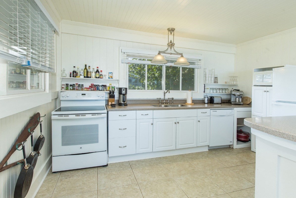 7206 Alamoo Road Hanalei, HI 96714 - Photo 8 of 17 a kitchen with a stove a sink and a dishwasher